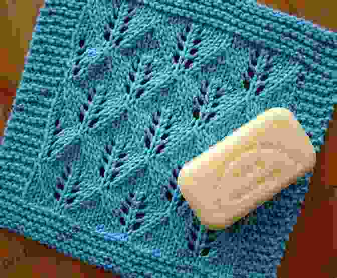 A Filet Crochet Washcloth With An Intricate Leaf Motif, In A Soft Shade Of White. Washcloth Crochet Projects Book: Amazing Ideas And Pattern To Crochet Washcloth