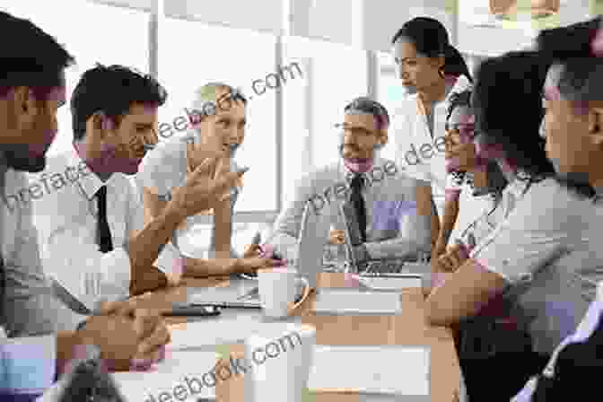 A Group Of Businesspeople Discussing Marketing Strategies In A Meeting Room The Business Promotion Techniques: Maximize Your Marketing Efforts