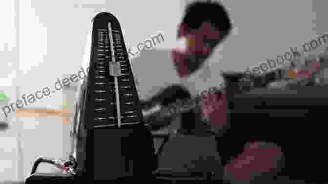 Guitarist Practicing With A Metronome In A Home Studio. The 7 Day Practice Routine For Guitarists