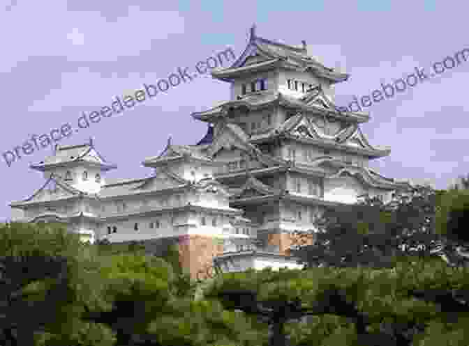 Himeji Castle In All Its Splendor, Showcasing Its Iconic White Exterior Against A Clear Blue Sky. Himeji Castle Youme Inoue