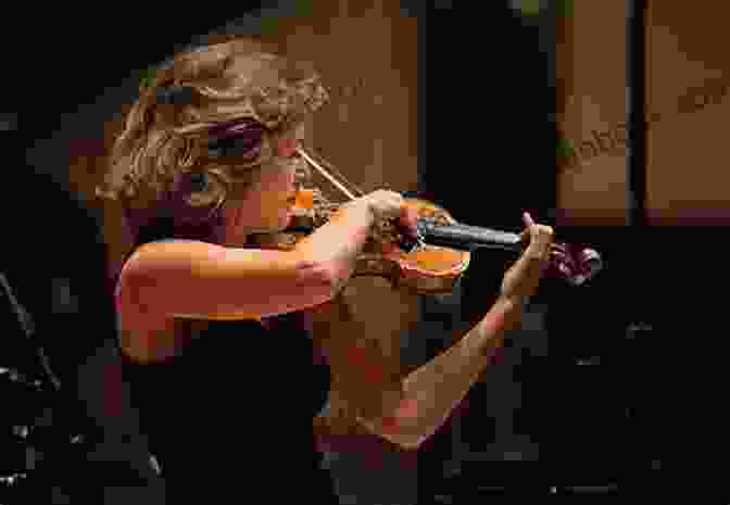 Violinist Performing A Captivating Solo Violin Piece On Stage Solo Time For Strings 4: Violin
